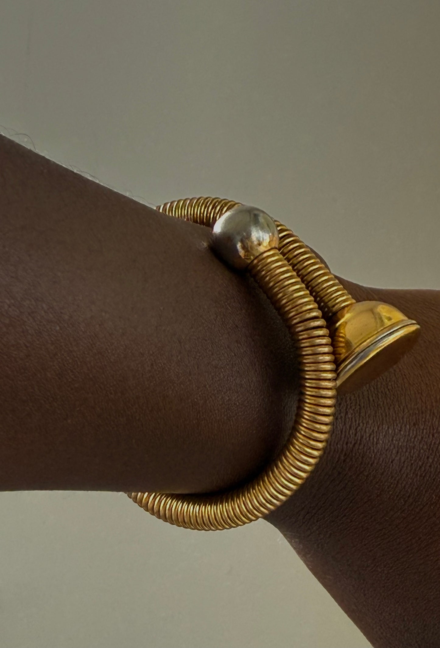 On HOLD MID CENTURY GOLD SPRING BRACELET LOCKET END