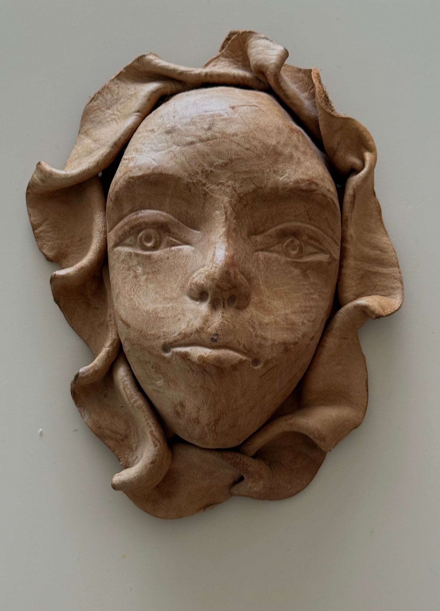VINTAGE LEATHER FACE WALL ART