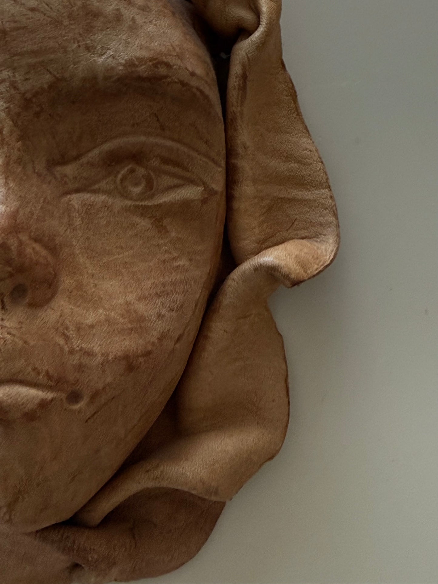 VINTAGE LEATHER FACE WALL ART